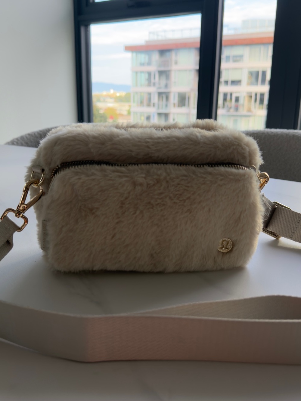 lululemon athletica Cream Faux Fur Crossbody Bag with Gold Hardware